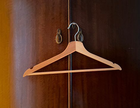 Coat hanger on an old wardrobe door