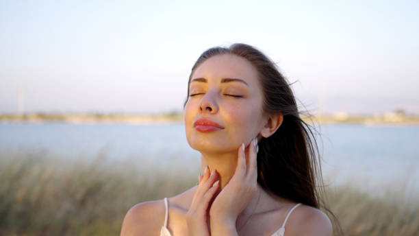 istock Peaceful young woman in nature 1546318174