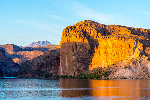 Canyon Lake in Arizona at sunset. Four Peaks can be seen in the distance.