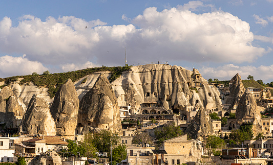 Goreme is known for its fairy chimneys, eroded rock formations, many of which were hollowed out in the Middle Ages to create houses, churches.