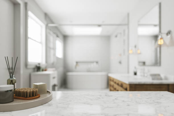 White Marble Countertop In Luxury Bathroom White marble countertop in a modern bathroom. domestic bathroom stock pictures, royalty-free photos & images