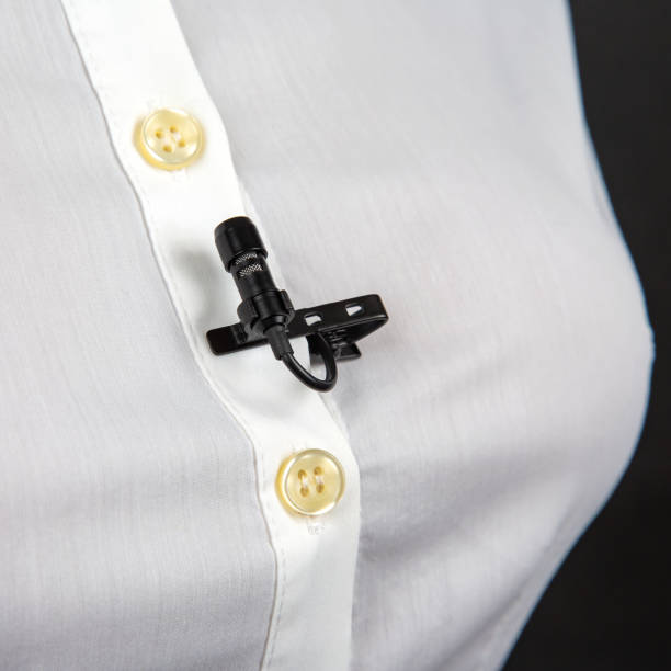 istock lavalier microphone for voice recording on the shirt. audio device technology. wired small microphone 1546792620
