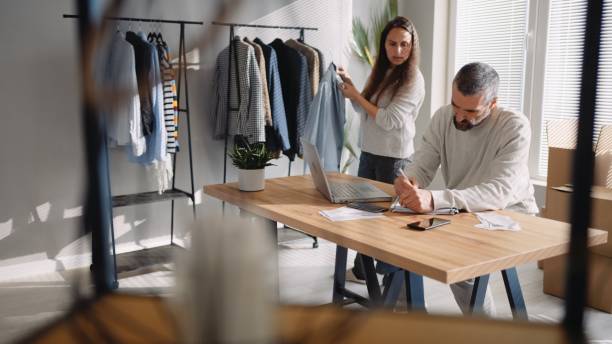 istock E-commerce. Small business owners running online store. 1546812161