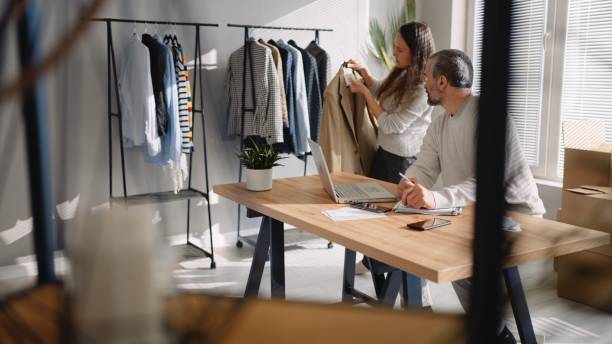 istock E-commerce. Small business owners running online store. 1546812165