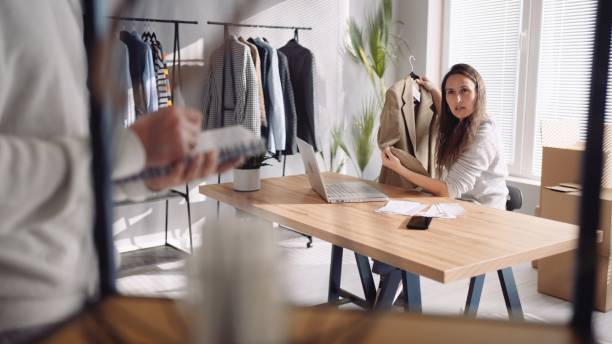 istock E-commerce. Small business owners running online store. 1546812170