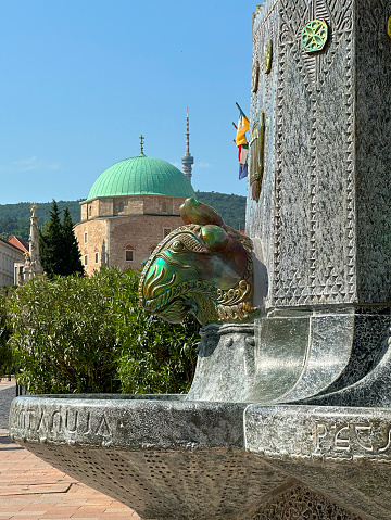 View of the eosin well of Zsolnay, designed by Andor Pilch in front of St. Sebastian Church.   The Art Nouveau fountain was built in 1912 in memory of Vilmos Zsolnay, a ceramic entrepreneur.