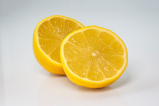 Close up of two halves of a cut lemon