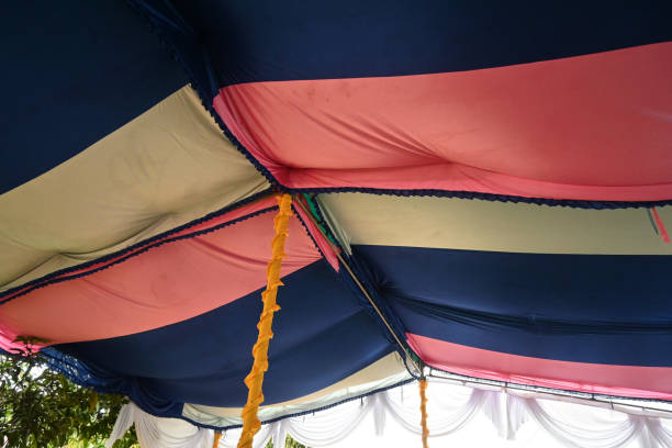 istock big colorful tent for a wedding reception in the village. 1546980310