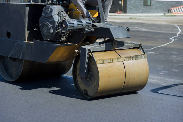 istock This is a process of asphalting roads by using asphalt special equipment a heavy vibration roller pavement operation. 1546994208