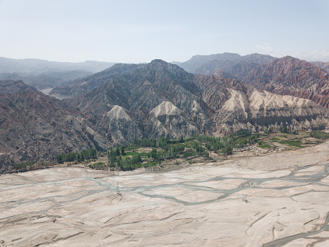 Desert, mountains and roads in Aksu Prefecture, Xinjiang, China