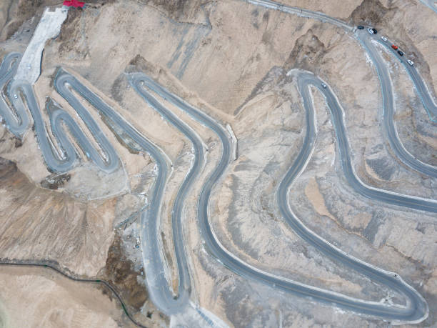 istock Mountain road in Tianshan Grand Canyon (u-turns) 1547113667