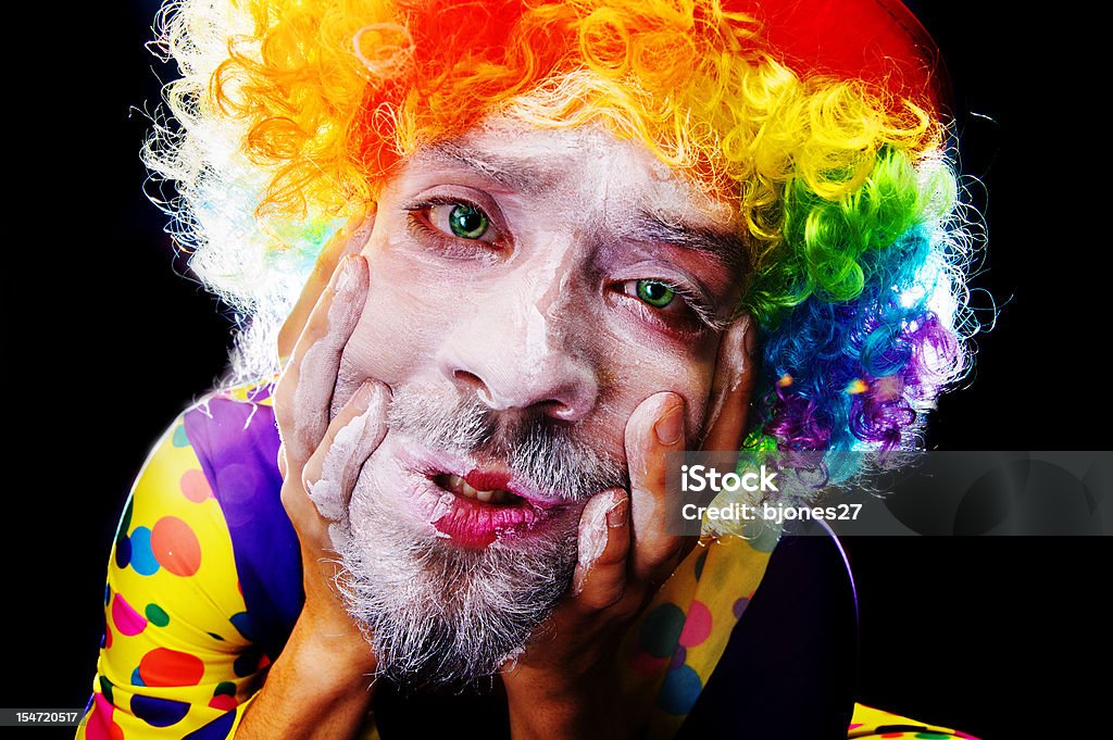 Effrayant homme Clown application de Maquillage traditionnel du visage - Photo de Adulte libre de droits