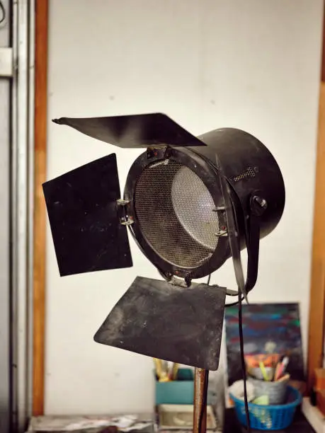 Photo of Antique fresnel studio on tripod . space for text