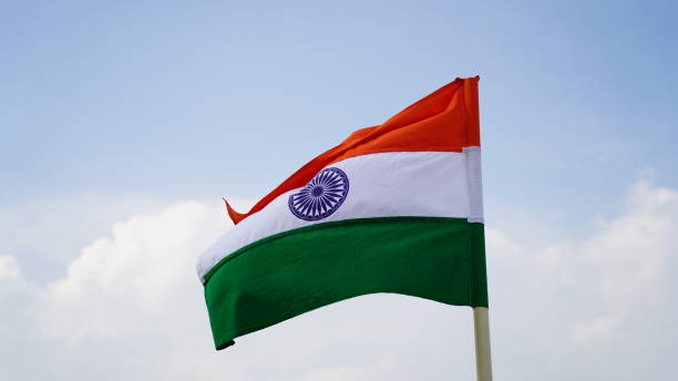 istock Indian Flag Flying high blue sky tricolour flag 1547290131