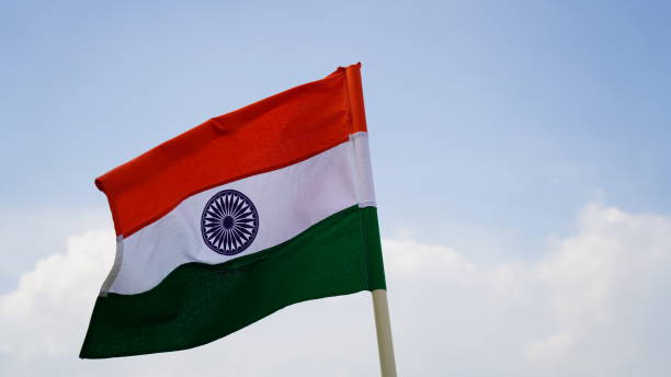 istock Indian Flag Flying high blue sky tricolour flag 1547290133