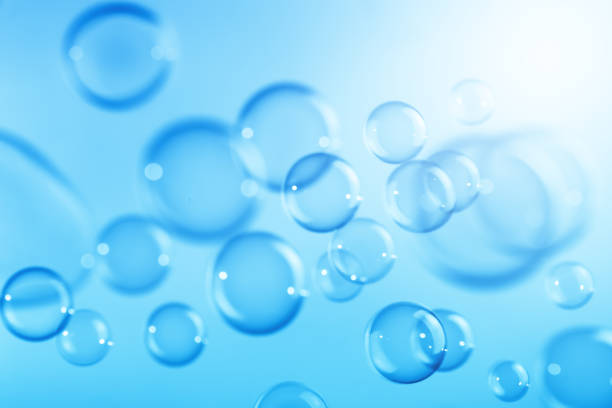 istock Beautiful Transparent Blue Soap Bubbles Floating in The Air. Abstract Background, Celebration Festive Backdrop, Refreshing of Soap Suds Bubbles Water. 1547292861