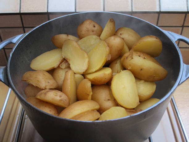 istock Boiled potatoes in a cast iron pot 1547510547