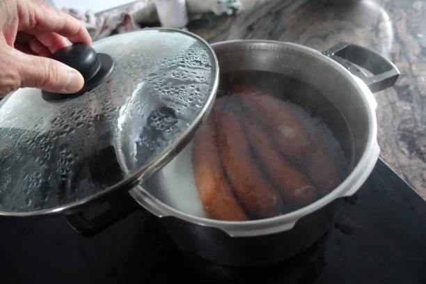 istock Boiled pork sausages in a pressure cooker 1547513147