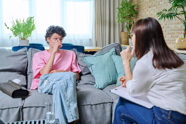 istock Young male having mental therapy in psychologist's office 1547529915