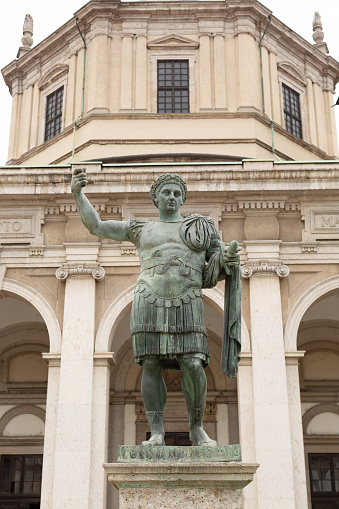 Milan, Italy, June 9, 2023: View of  statue of Emperor Constantine I, better known as Constantine the Great, in front of the Basilica of San Lorenzo in Milan.