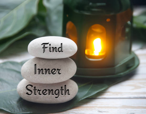 istock Find inner strength words engraved on zen stones. Motivational concept. 1547669874