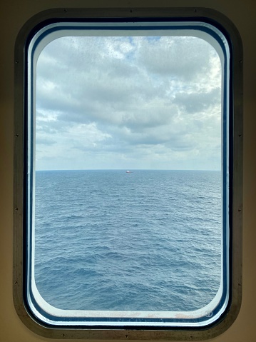 Sea view from a window on the ship