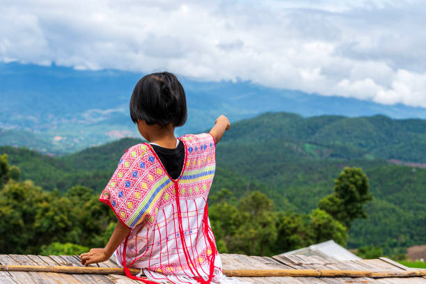 Pakhayo girl looking to beautiful rice terraces. Ban Pa Bong Piang That has the most beautiful rice terraces in Thailand. Pakhayo girl looking to beautiful rice terraces. Ban Pa Bong Piang That has the most beautiful rice terraces in Thailand. miao minority stock pictures, royalty-free photos & images