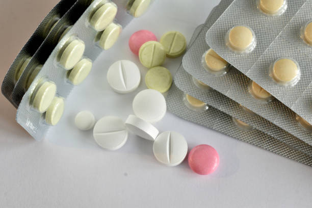 istock Tablets in packages, different colors and purposes. Medicine. 1547761108
