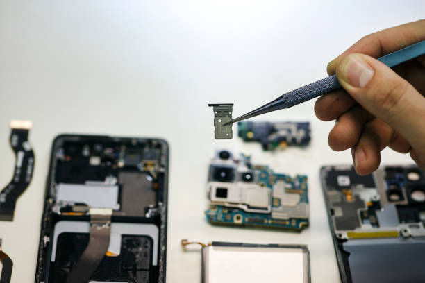 istock Repairing a mobile phone 1547867160