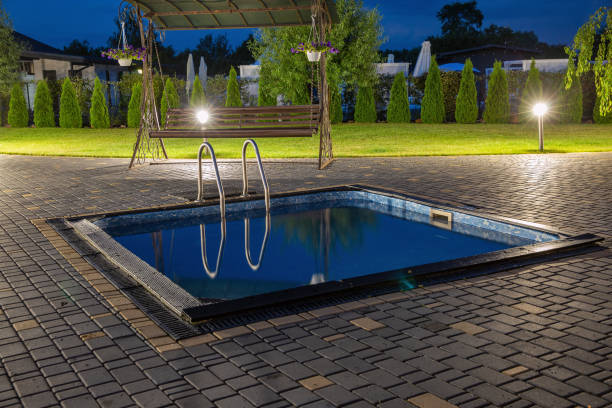 istock Small outdoor swimming pool in the evening. 1547888884