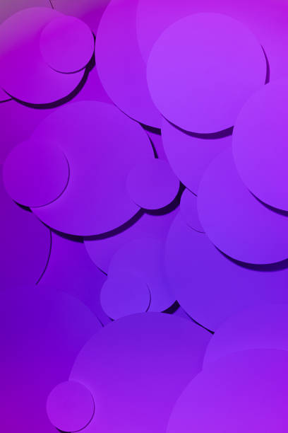 istock Bright purple pink gradient abstract background of soar paper circles pattern of different size, top view, backdrop for advertising, design, card, poster, flyer, text, in futuristic fantasy style. 1547889998