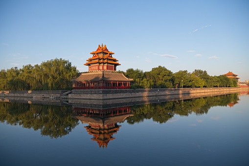 Outside of Forbidden city during and a bit after sunrise. Mostly Forbidden city is surrounded by moat and each corner is ancient watch tower.