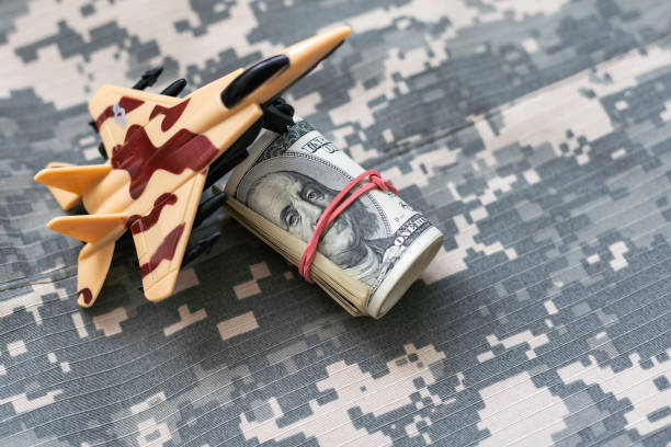 istock Plastic toy military jet plane on background. 1547921713