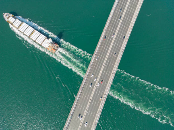 istock Aerial view of a cargo container ship passing under bridge. Istanbul Bosphorus. 1547933968