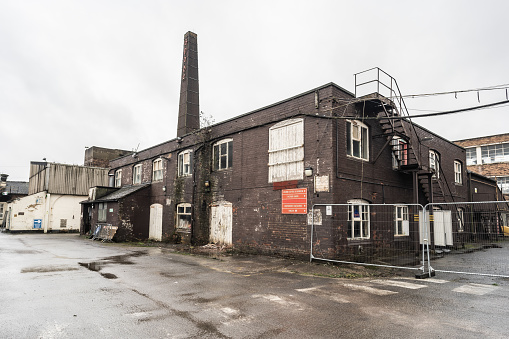 High resolution photograph of an ancient industry building.