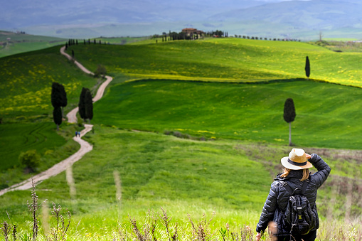 Pienza, Tuscany, Italy: Woman on the Gladiator scenery in the Elysian Fields in Val d'Orcia