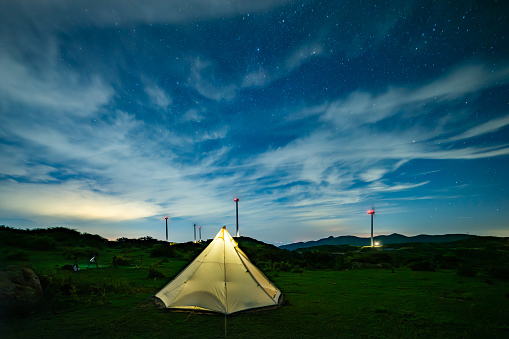 sky with stars,tent in the mountains