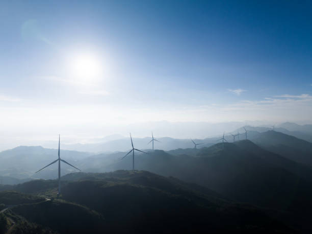 istock Mountain tops lined with wind turbines 1547969736