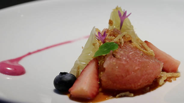istock Pomelo Garden, Two types of pomelo topped with berries, chili paste dressing with deep fried crispy shallot. 1548011271