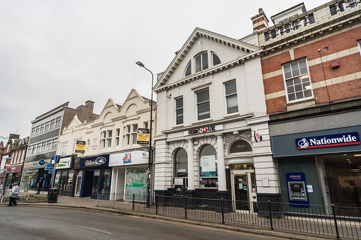 Crewe, Cheshire, England, February 21st 2023. Nationwide Building Society and HSBC bank on the high street. Financial and editorial travel illustration.