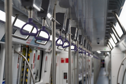The subway carriage is empty, and the concepts of transportation and railway transportation