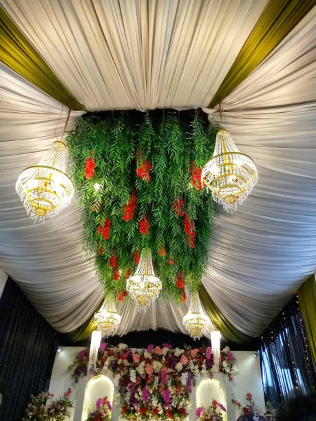 istock party place decoration with lights and flowers 1548098492