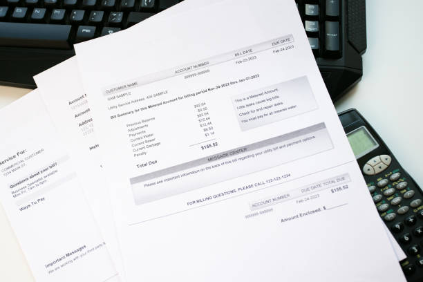 istock Utility bill, Heat and water utility bill for a house 1548130913