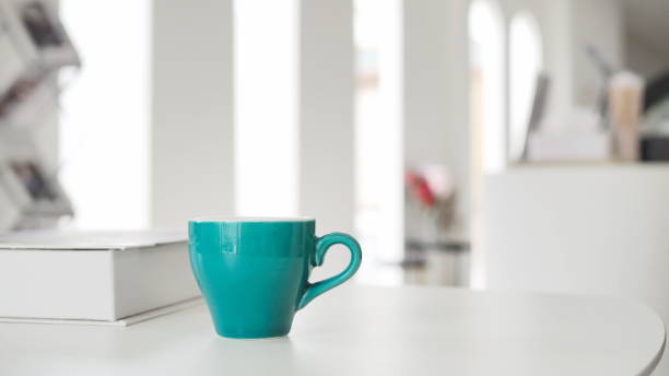 istock green coffee cup Put it on the table at the coffee shop. 1548156929