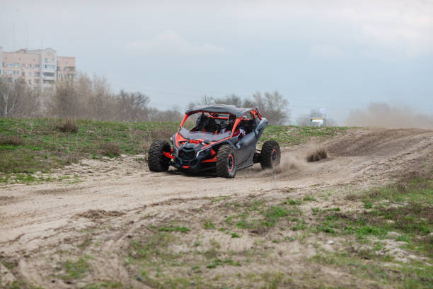 istock Offroad extreme vehicle racing in dust. ATV, buggy, quad, UTV, 4x4 1548166957