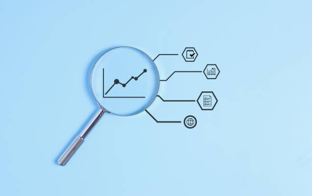 istock Graph and progress of business and analyzing financial investment 1548230782