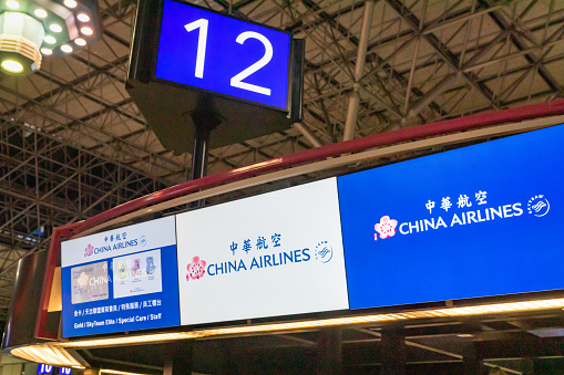 Taipei, Taiwan - 04.15.2019: China Airlines Check-in counter sign at Taiwan Taoyuan International Airport, Taiwan