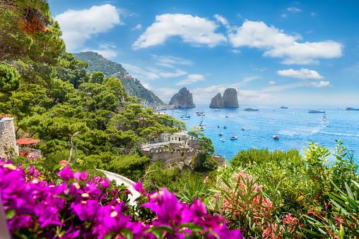 Tourist enjoy travel at Positano, Amalfi Coast, Italy. View of the coastline and seaside from a colorful house and retail in Positano, Amalfi Coast, Italy