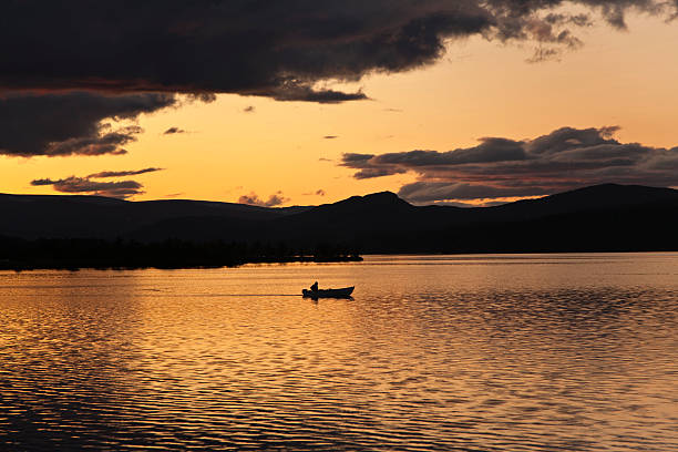 Beautiful sunset on the fjord in Norway. Summer landscape