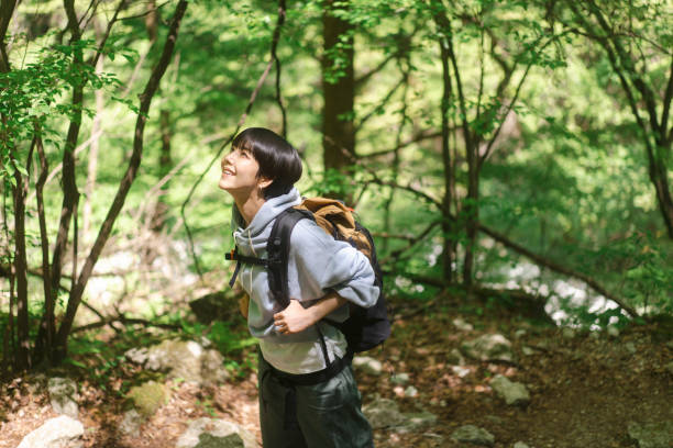 istock A  woman climbing a mountain. 1548389159